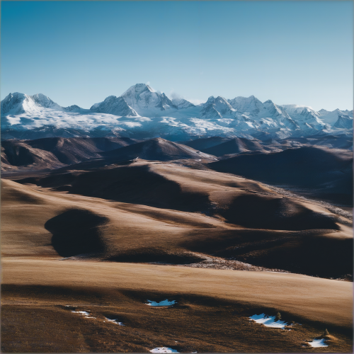 A-snowy-mountain-range-with-a-clear-blue-sky..png